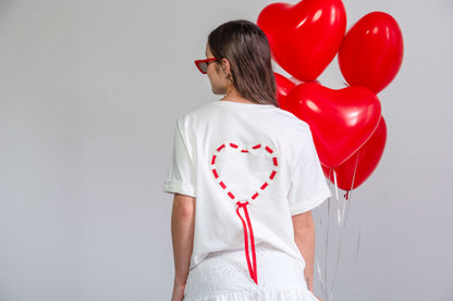 CAMISETA CUELLO REDONDO CORAZON LAZO